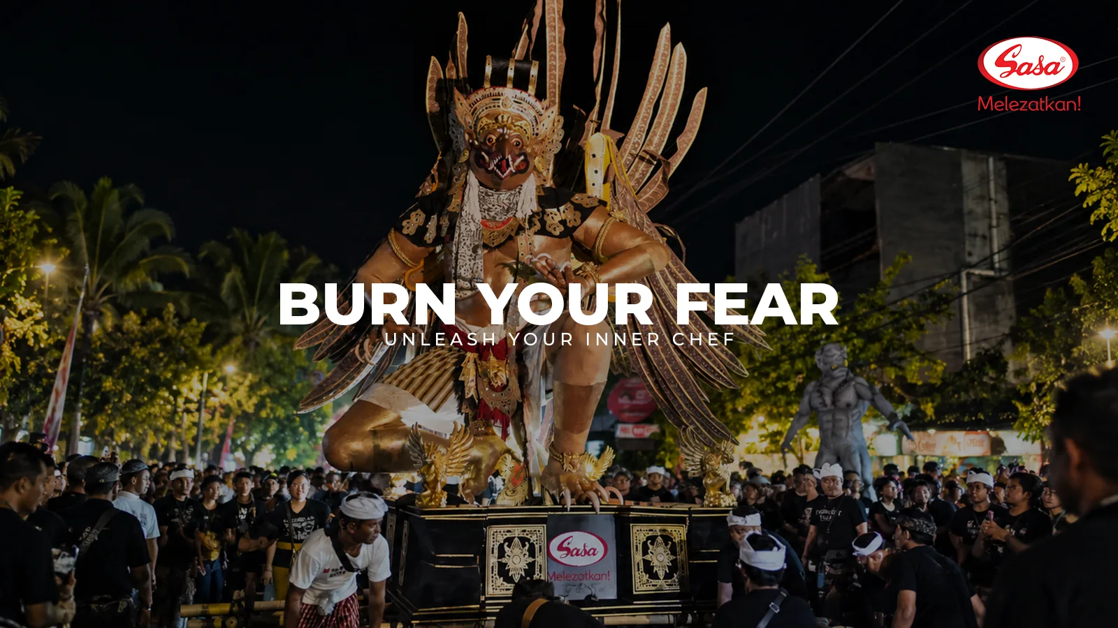 Burn Your Fear key visual: the Sasa Garuda Ogoh-Ogoh carried through the crowd at night